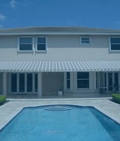 Awning in backyard with swimming pool
