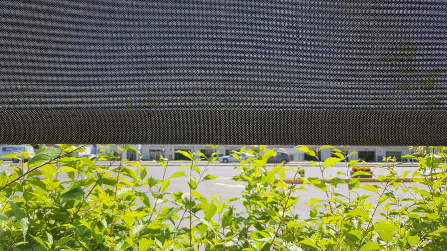 A solar screen in a picture window