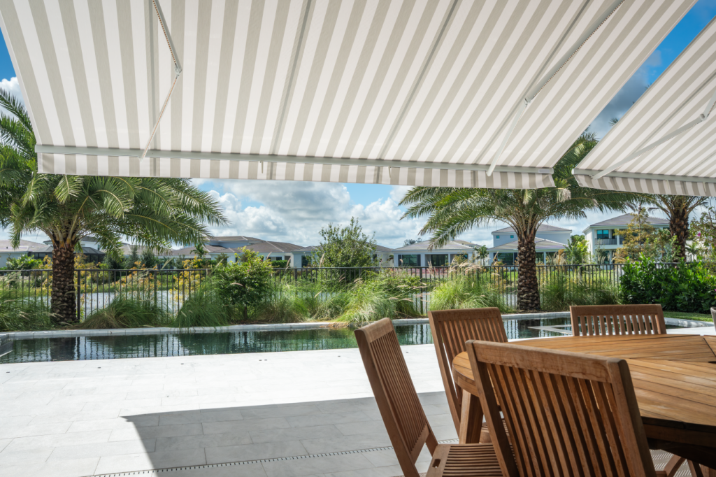 Patio in Palm Beach Gardens with new double awnings installed by Solarus USA